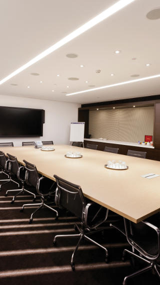 Esta sala de reuniones de Westfield Sydney utiliza controles de iluminación para oficinas de Philips para ayudar a ahorrar energía